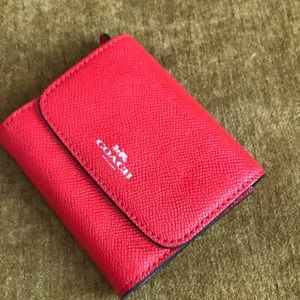 Coach small wallet.